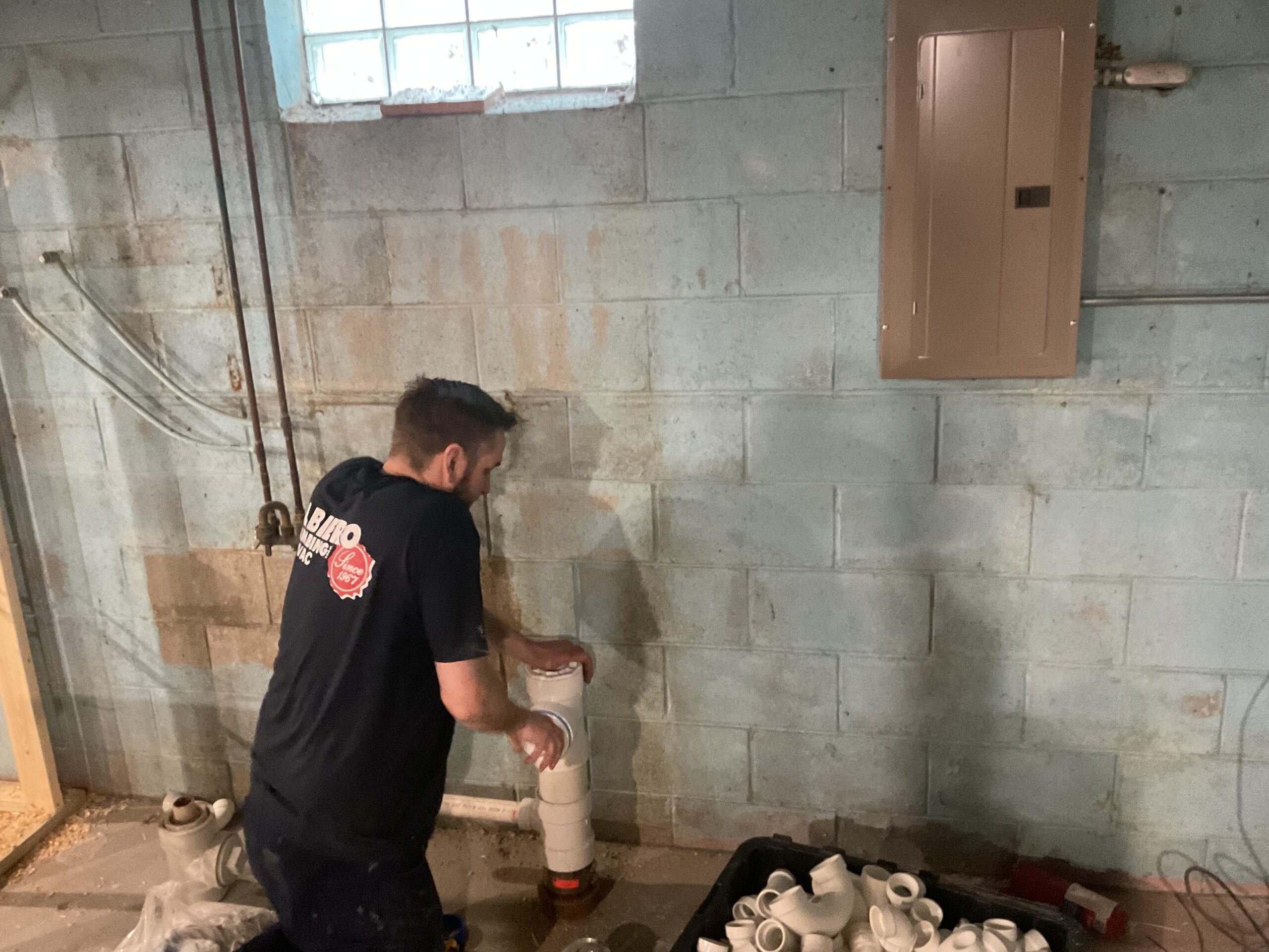 Albiero tech fitting PVC pipe assembly in basement