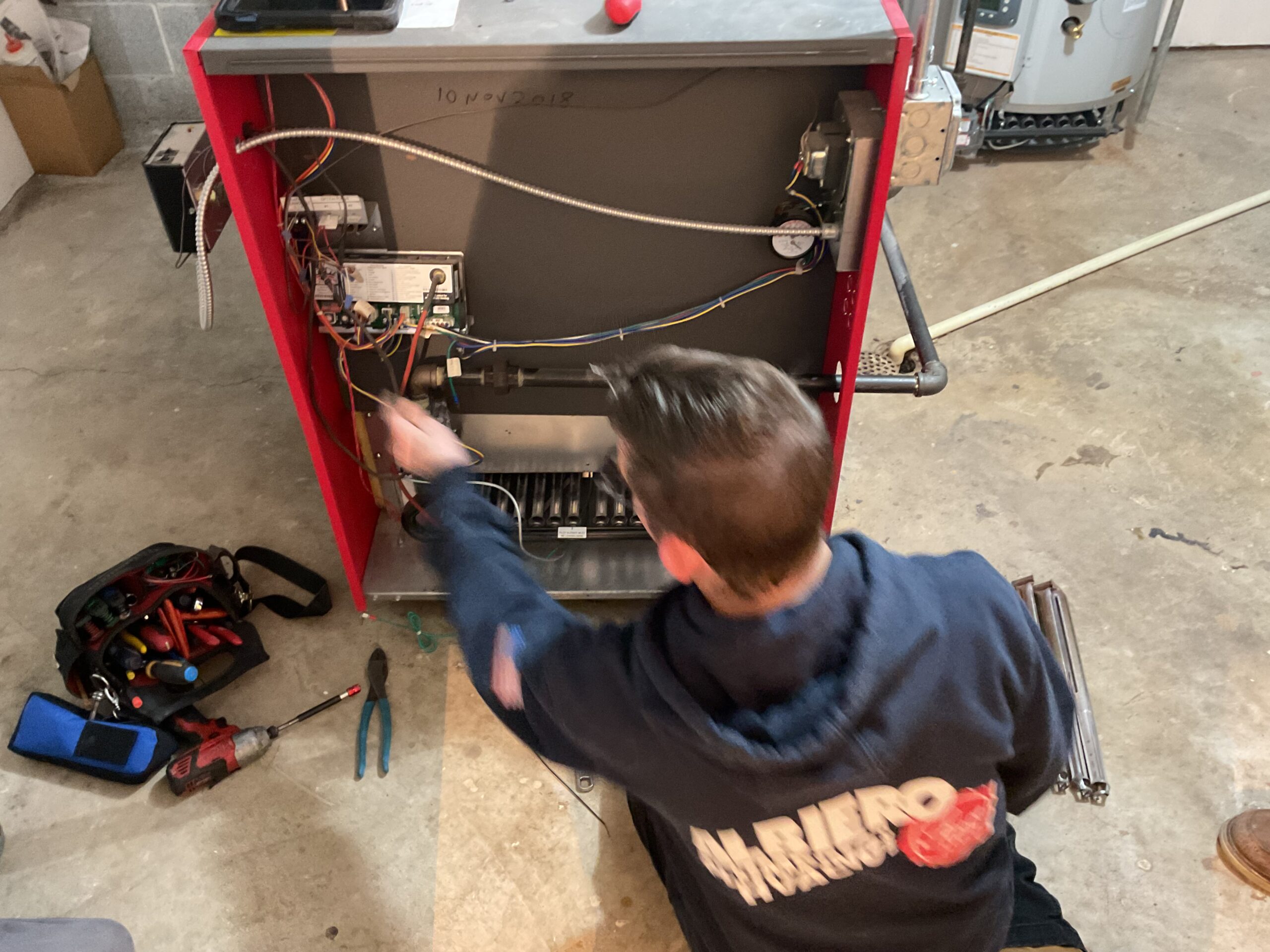 Albiero tech repairing furnace internals